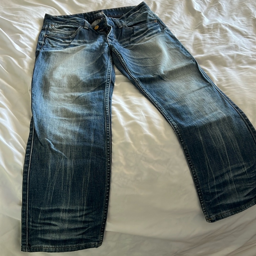 Express Jeans in Size 4 regular, wide ankle cut, distressed blue